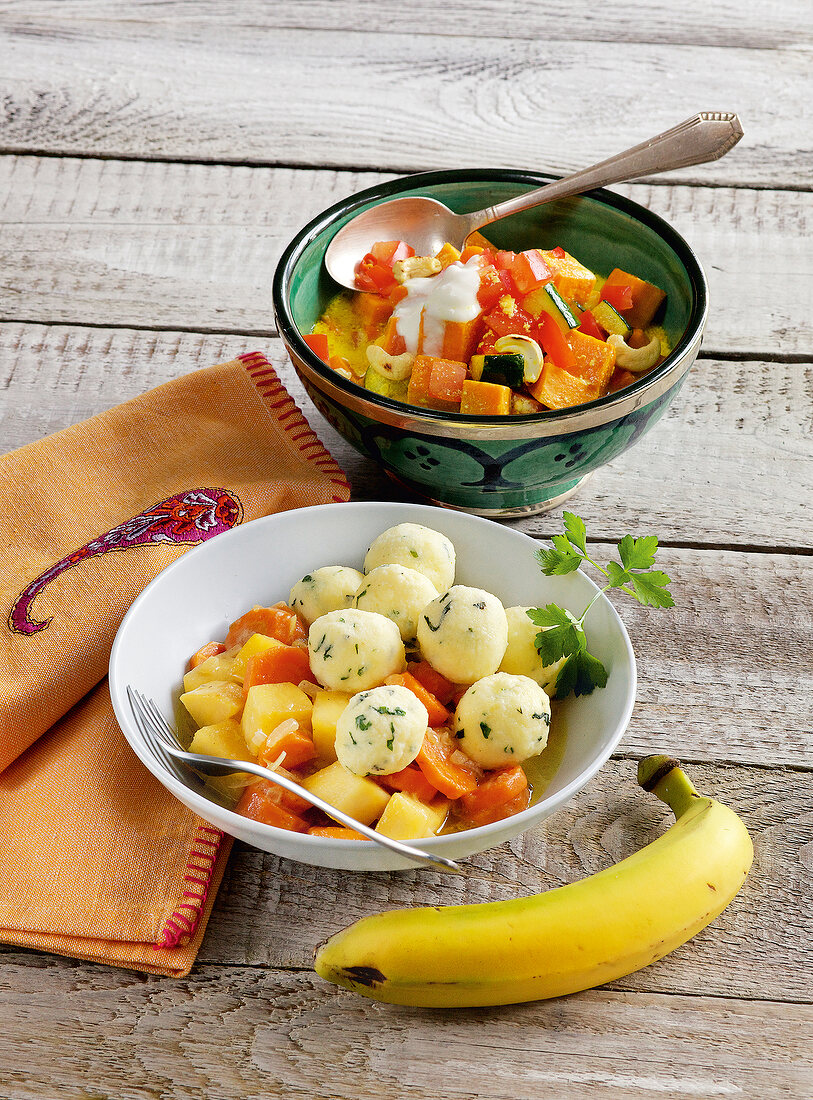 Turnip stew with meatballs and sweet potato curry in bowls