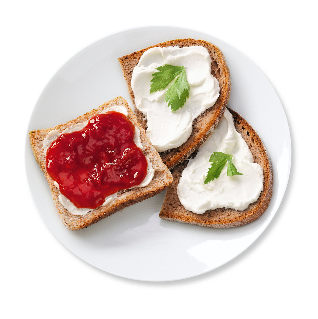Bread with jam and cream cheese on plate