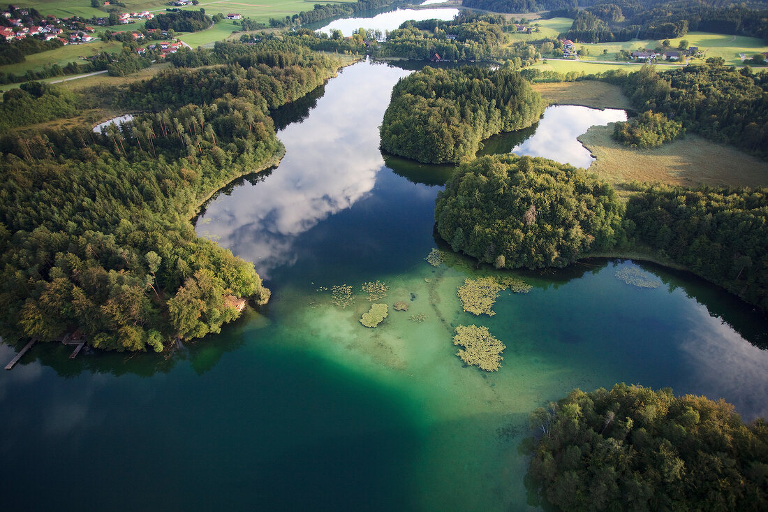 View of castle Hartmannsberg around Eggstatt Hemhofer Lake in Bavaria, Germany