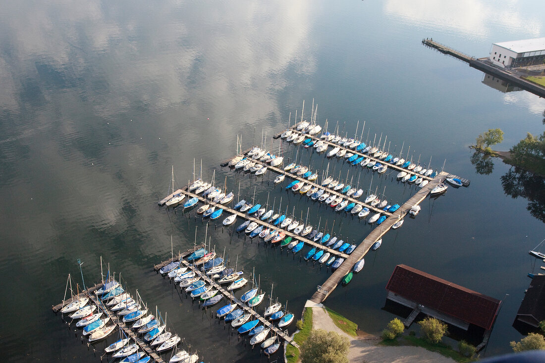Aerial view of boats parked in port at Prienavera, Prien am Chiemsee, Bavaria, Germany