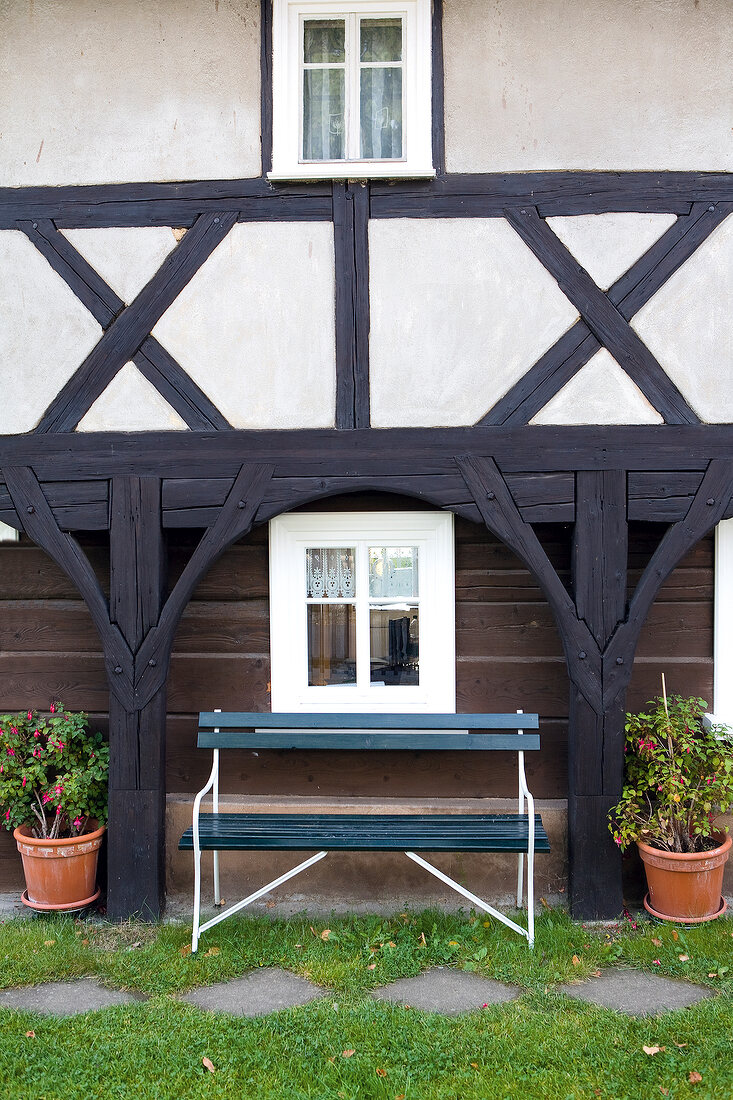 Bench in front of a half-timbered house, Saxony, Germany