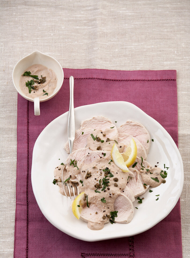 Turkey with cream tuna on plate