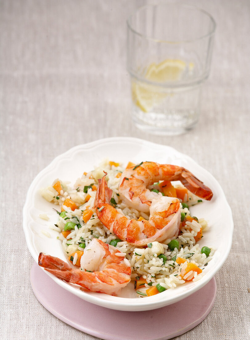 Shrimp scampi on rice skillet in bowl