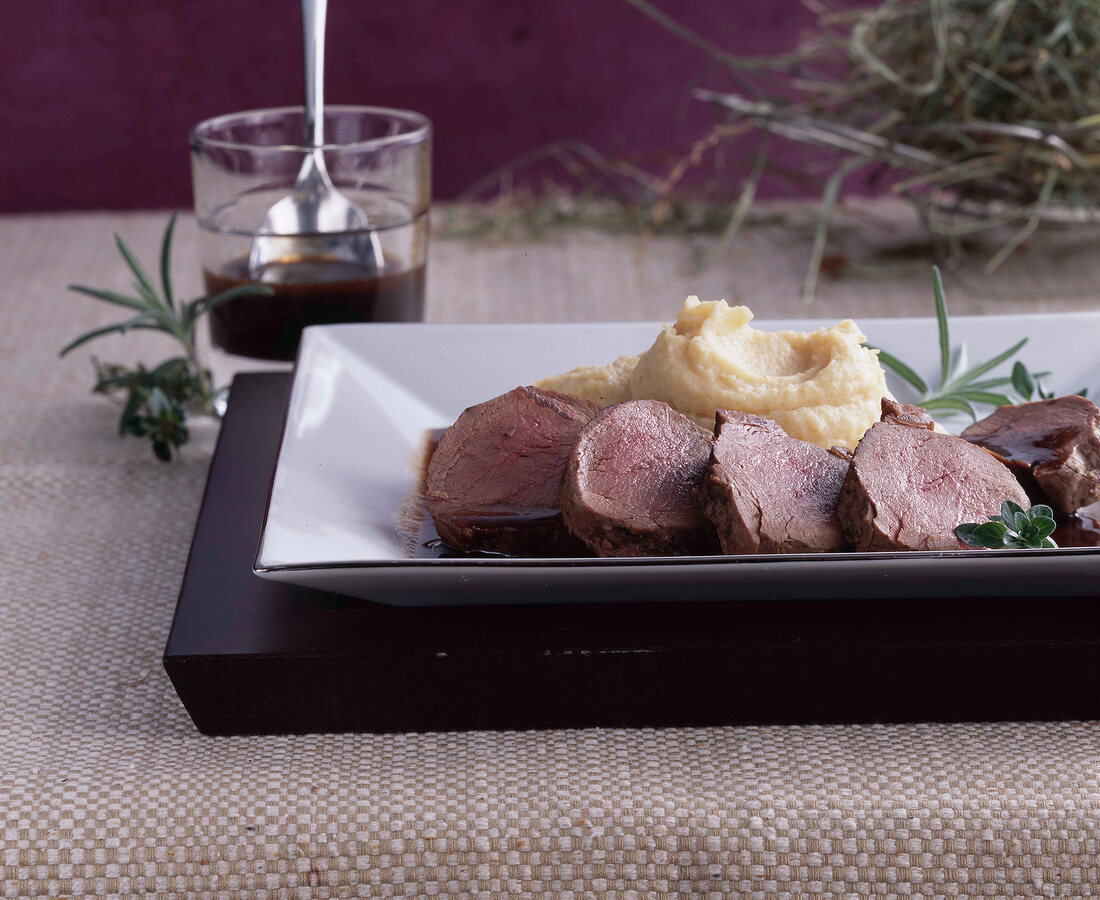 Venison with steamed hay, celeraic puree and mocha sauce