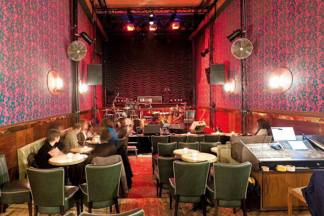 People dining in Le Bourg Music Club, Rue de Bourg, Lausanne, Switzerland