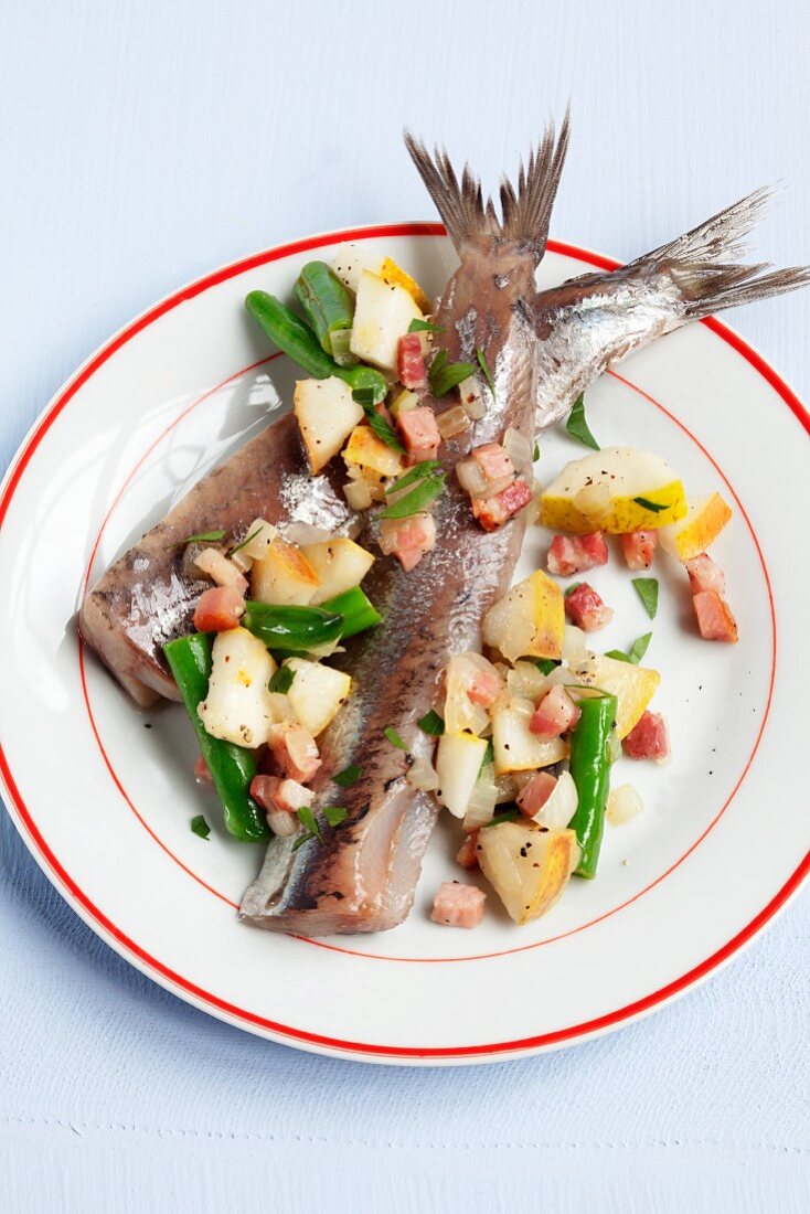 Soused herring with pears, beans and bacon