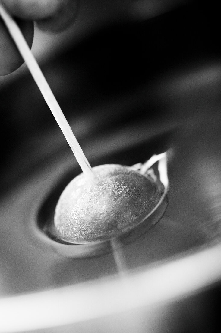 Preparation of strawberry candies, close-up