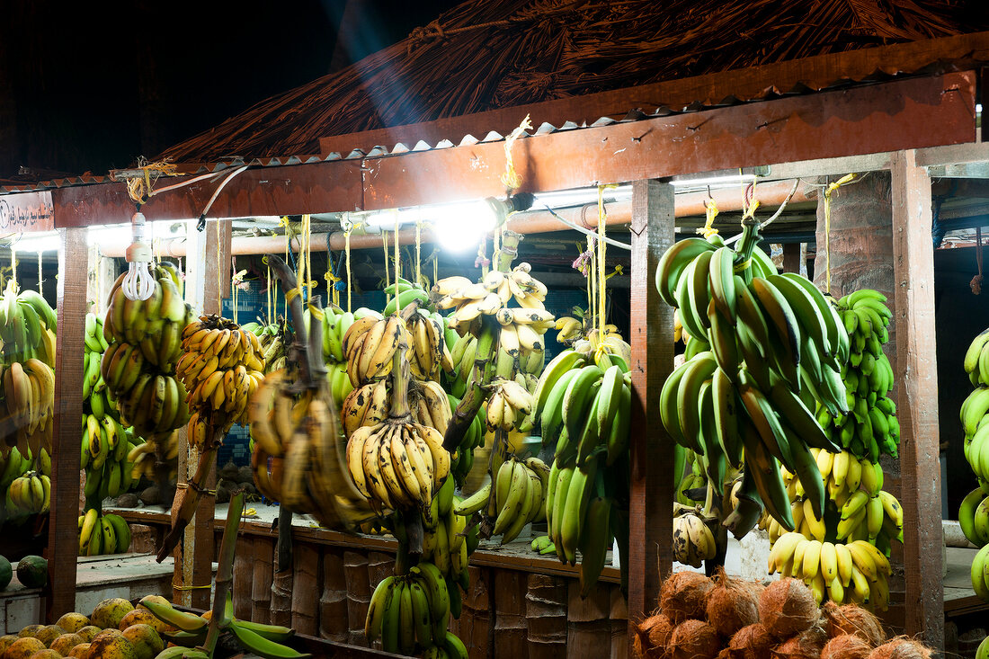 Fruit stall with variety of banana at night in Salalah, Dhofar, Oman