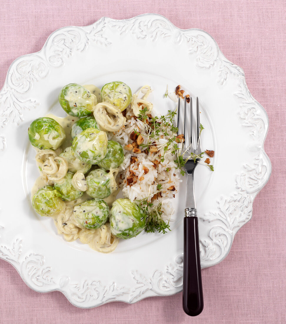 Brussels sprouts with lemon cream on plate