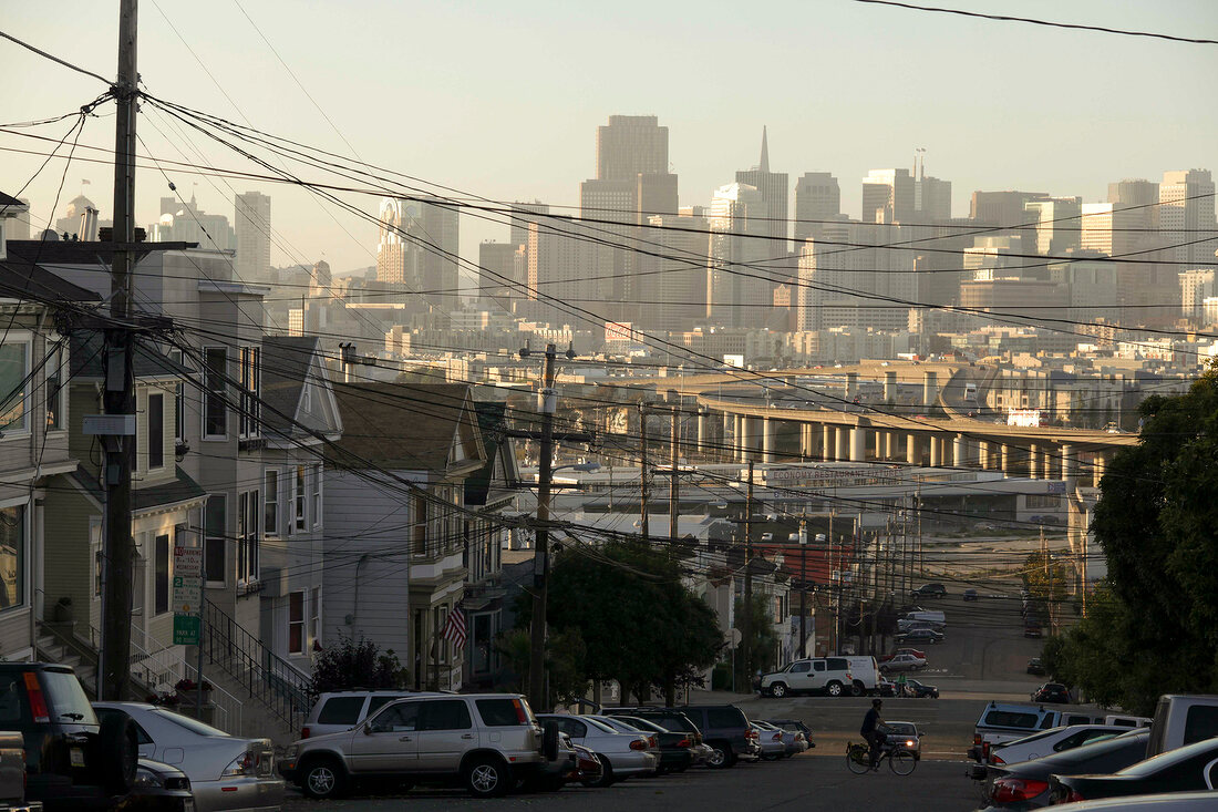 View of Skyline and city streets with power cables in San Francisco, California, USA