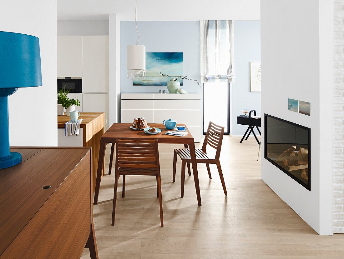 Dining area in front of fireplace