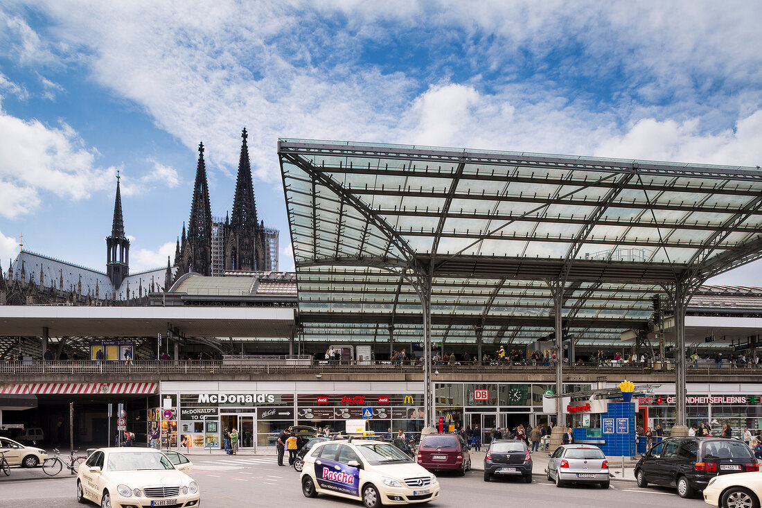 View of main railway station and parking lot of Cologne Cathedral, Germany