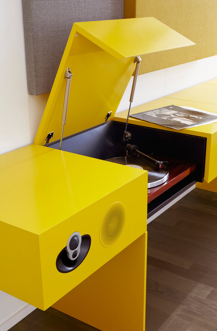 Yellow side table with music system