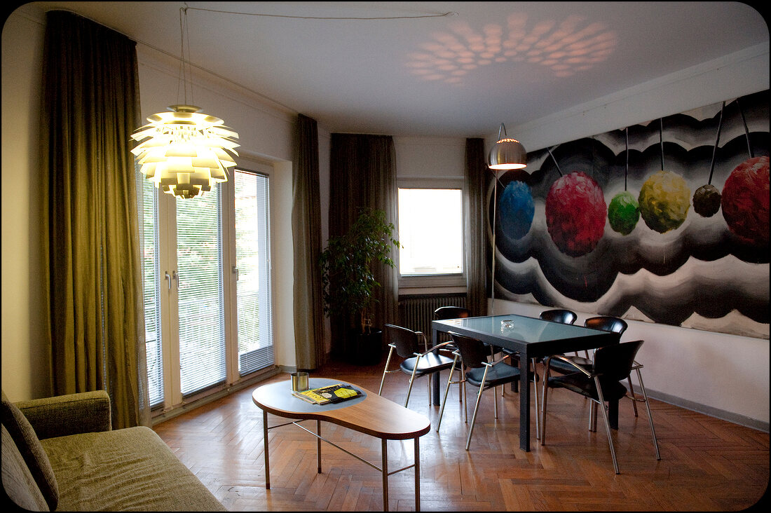 Interior of Hotel Chelsea with designer furniture and painted wall, Cologne, Germany