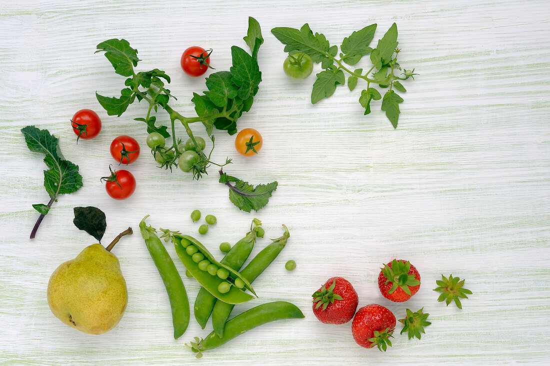 Various vegetables and fruits on white background