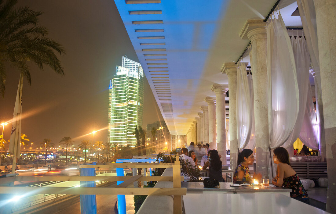 People dining at lounge in luxury Hotel Phoenicia, Beirut, Lebanon