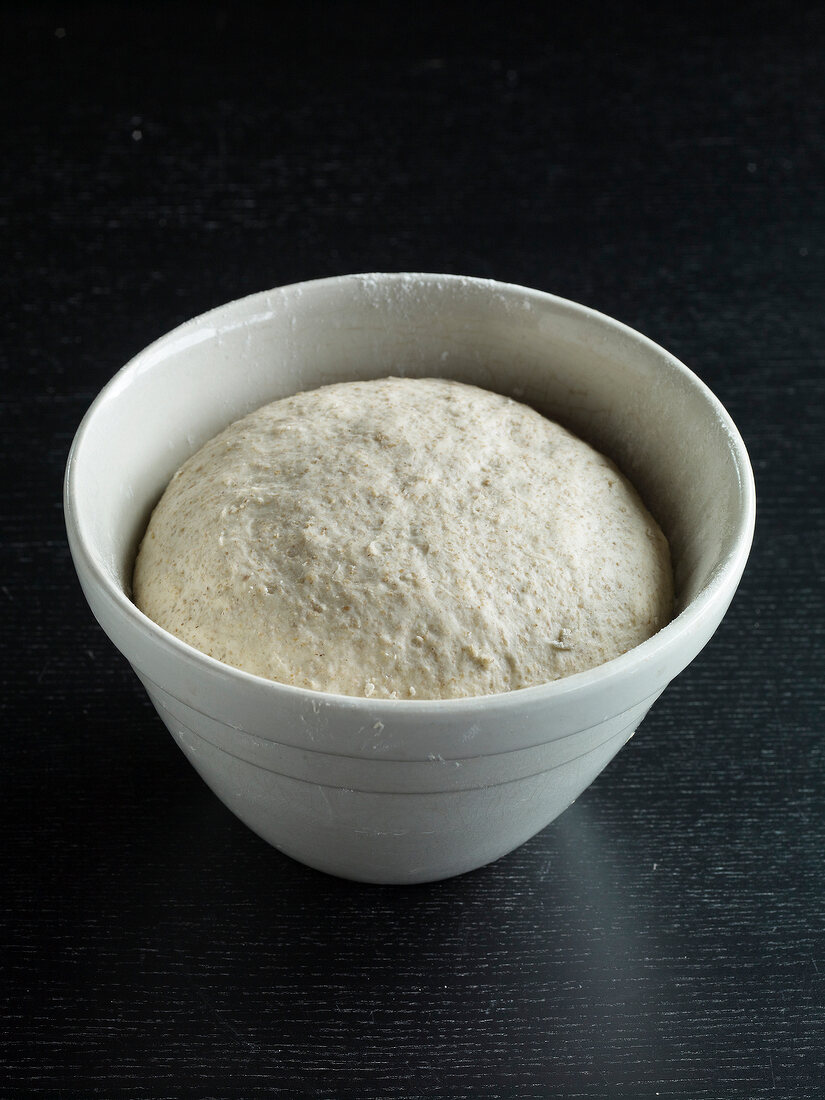 Dough in bowl for fermenting while preparing bread, step 5