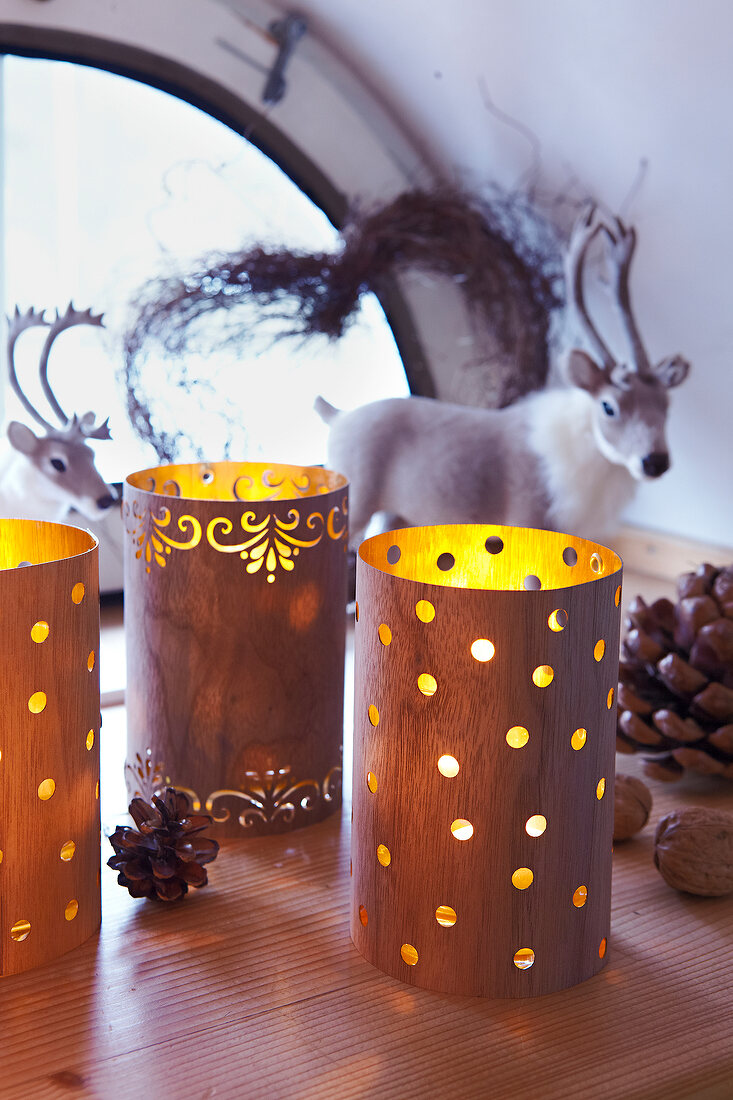 Lanterns made from walnut wood decorated for Christmas