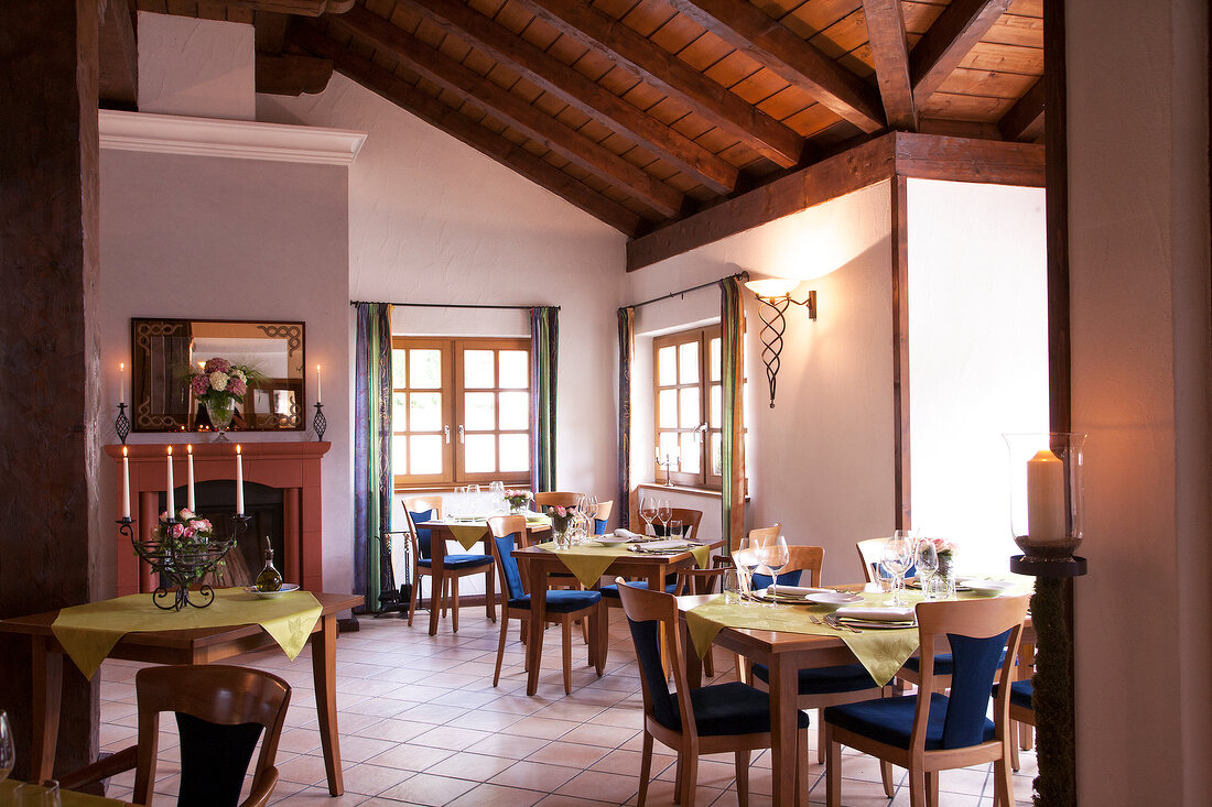 Tables laid in restaurant Hugenhof, Simon forest