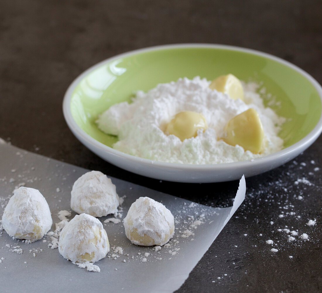 Chocolate, guava and lime truffle on wax paper and in bowl