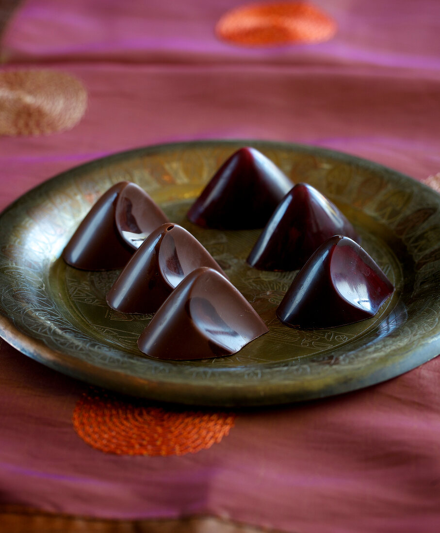 Honey chocolates in peak shape on plate