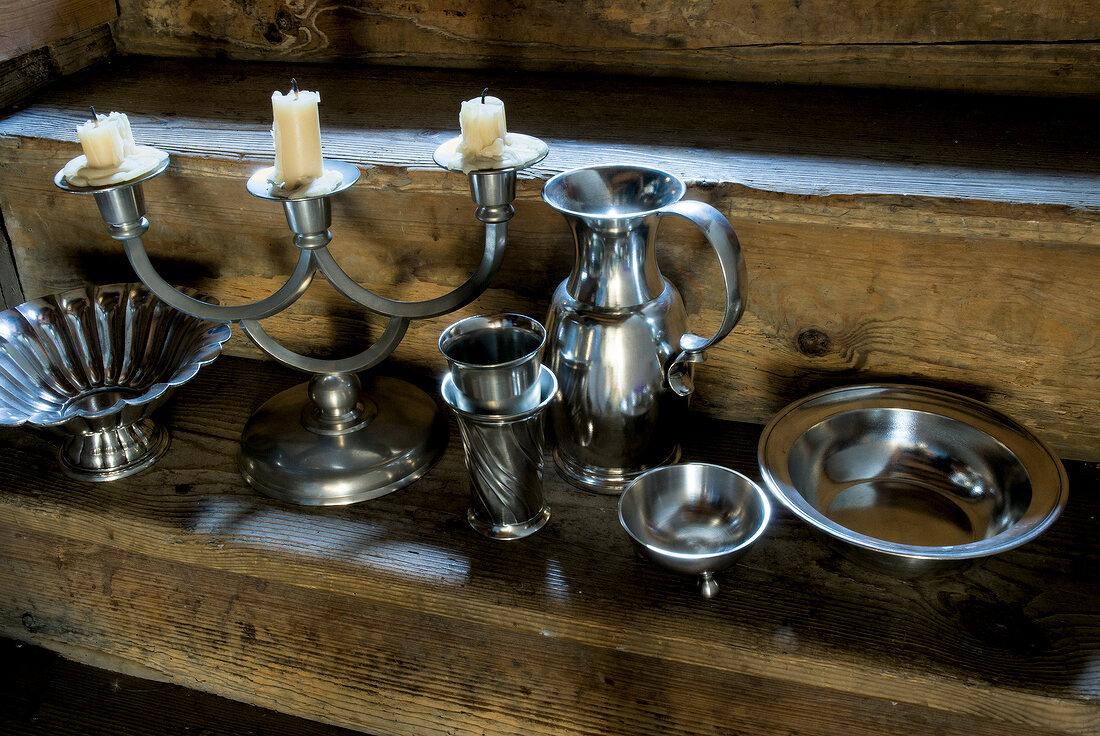 Tin, pewter, candle stand and pitcher plate made of tin