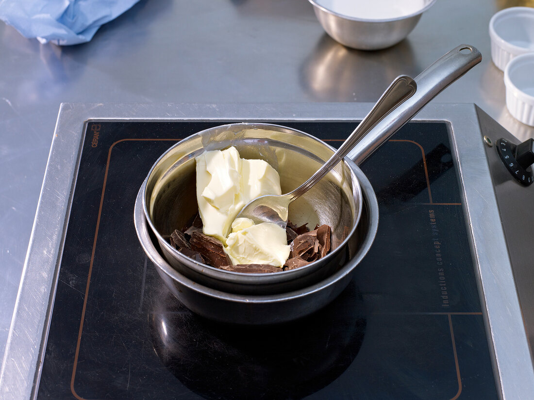 Melt butter and chocolate in bowl with hot water in saucepan