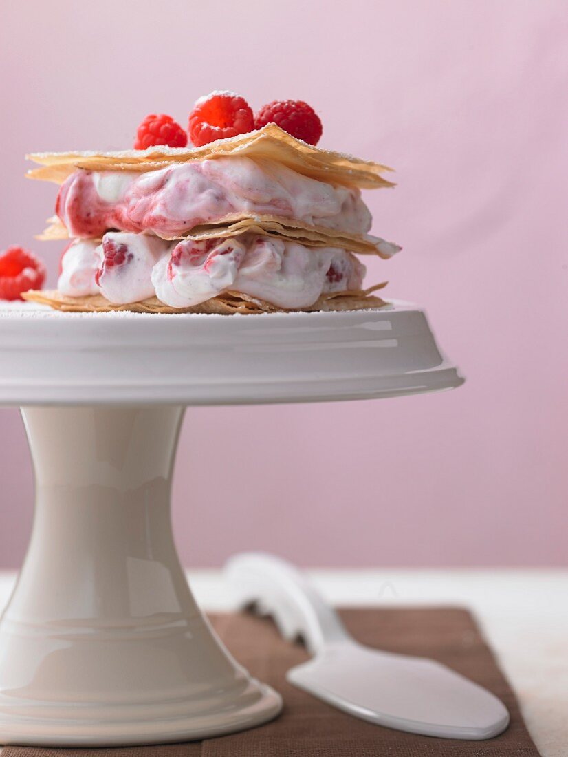 Sheets of crispy pastry with raspberry quark cream