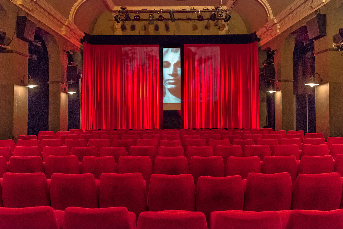 View of red chairs at Apollo Studio in Linden, Hannover, Germany