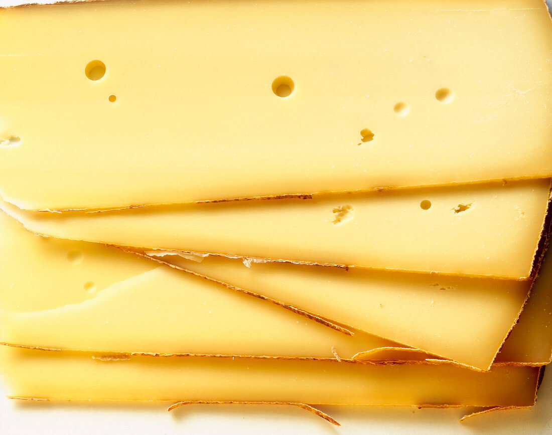 Close-up of stack of sliced cheese