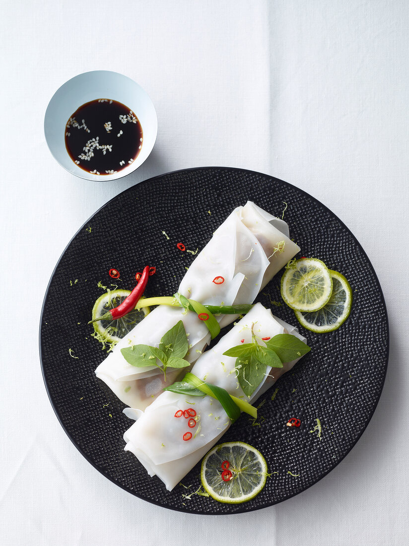 Thai duck rolls on plate, overhead view