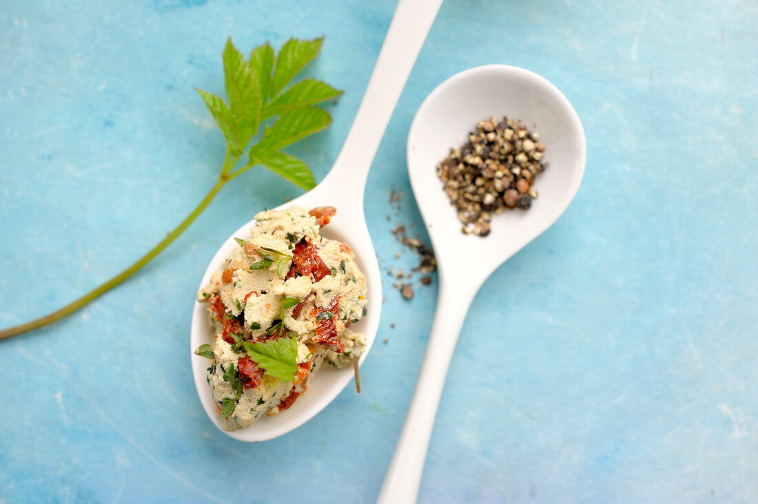 Tofu with cream and thyme seeds on spoons