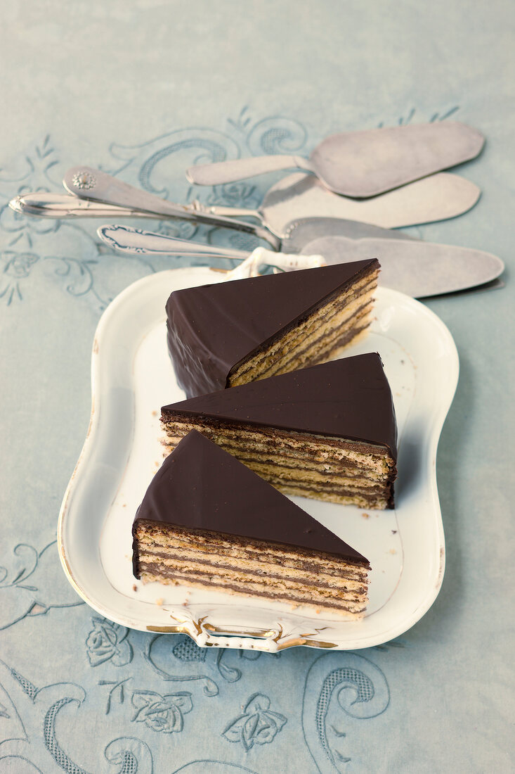 Three slices of Prince Regent cake in tray