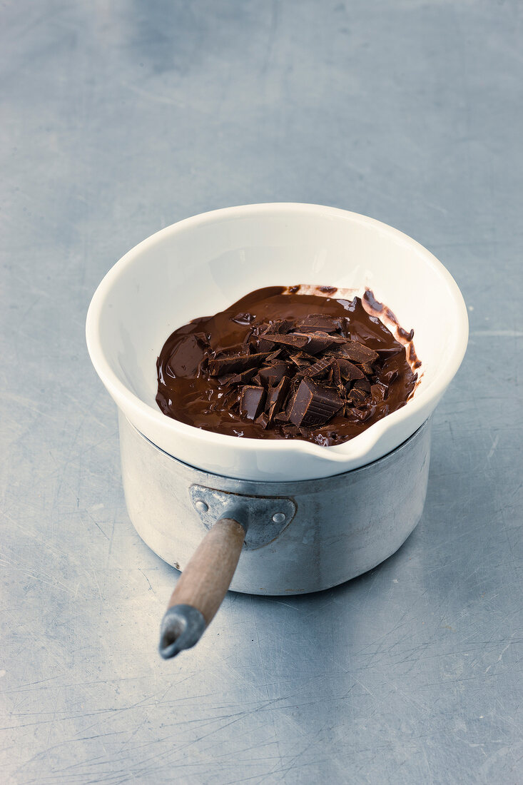 Chocolate melted in bowl on sauce pan with hot water