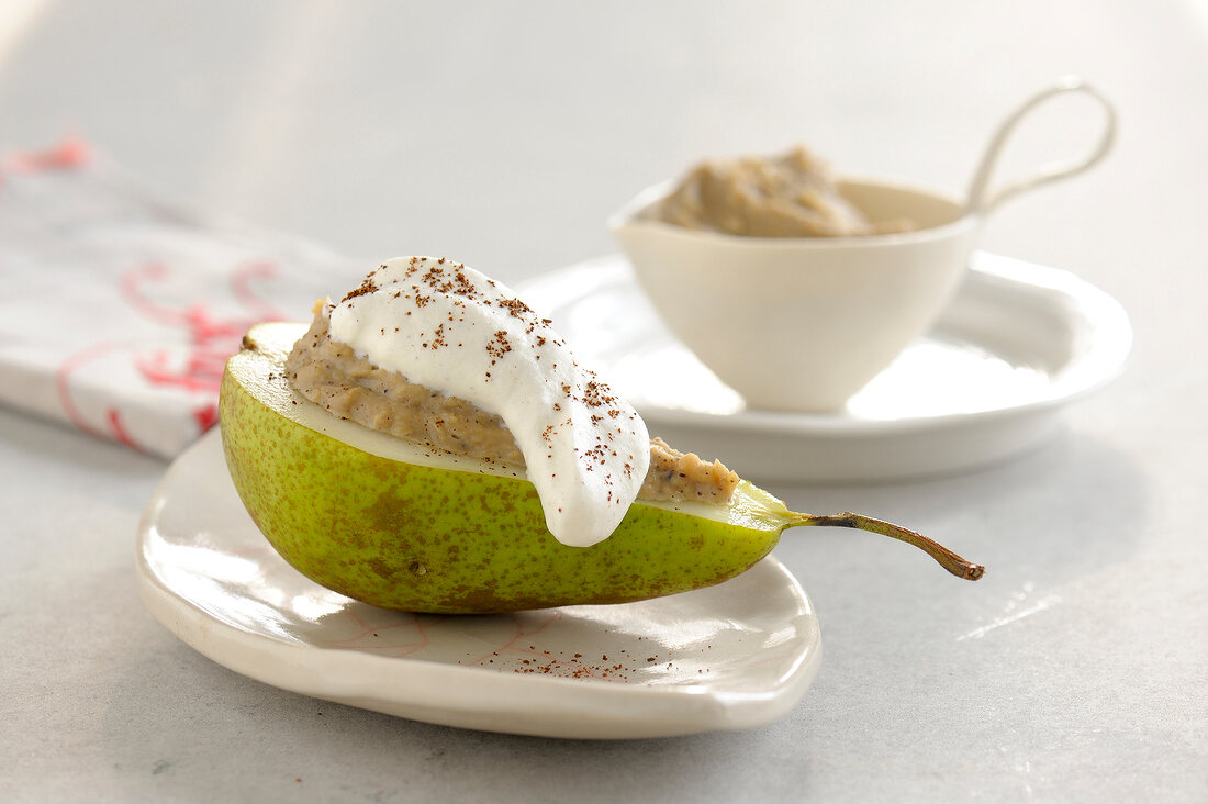 Pear stuffed with chestnut cream on plate