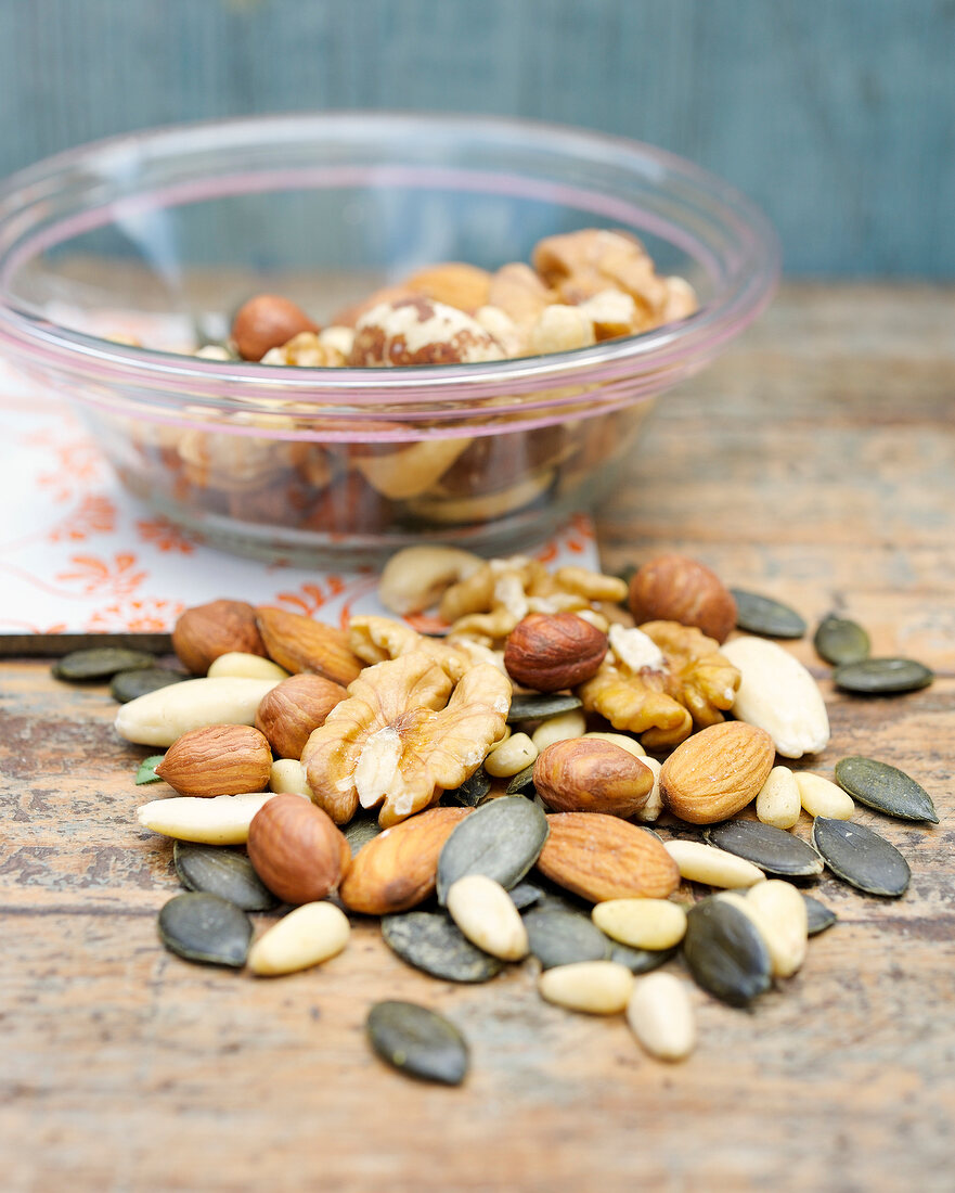 Nuts and seeds on wooden table