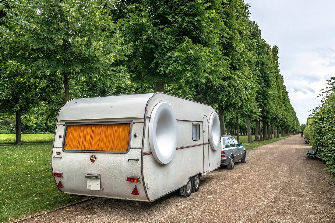 Caravans and car parked in Royal Gardens, Herrenhausen Palace, Hannover, Germany