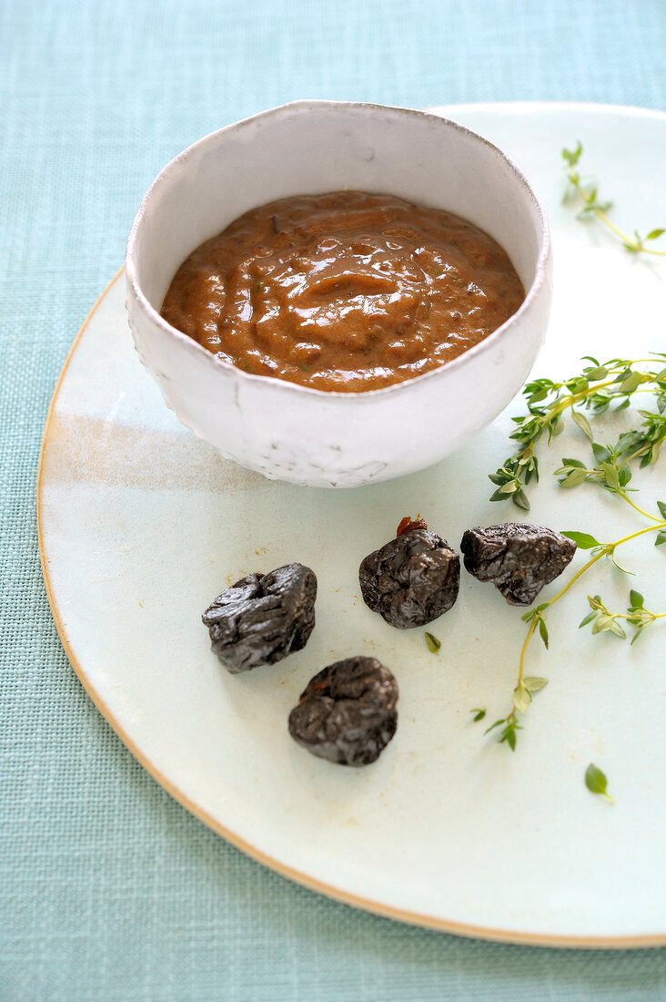 Plum puree in bowl