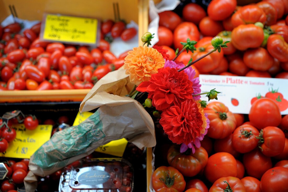 Bouquet on boxes of tomatoes