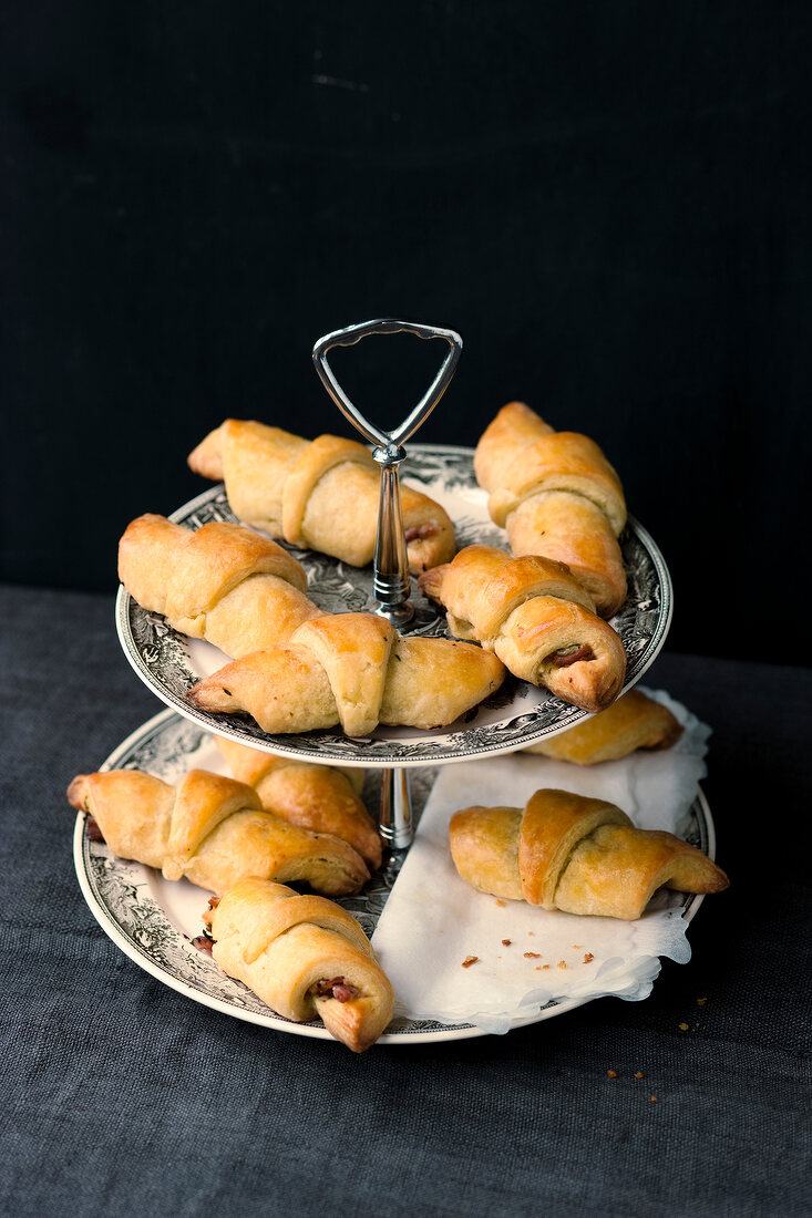 Ham croissant on cake stand