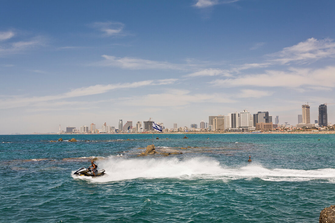 Man riding jet ski in Mediterranean Sea, Tel Aviv, Israel