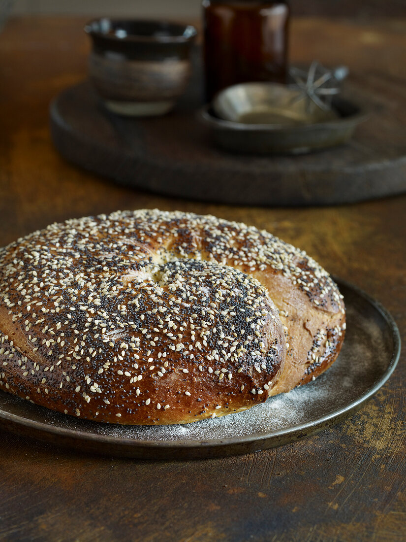 Jewish Challah bread with sesame seeds on plate