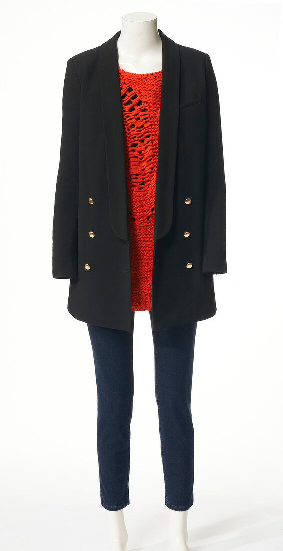 Oversize blazer with red sweater and jeans on mannequin