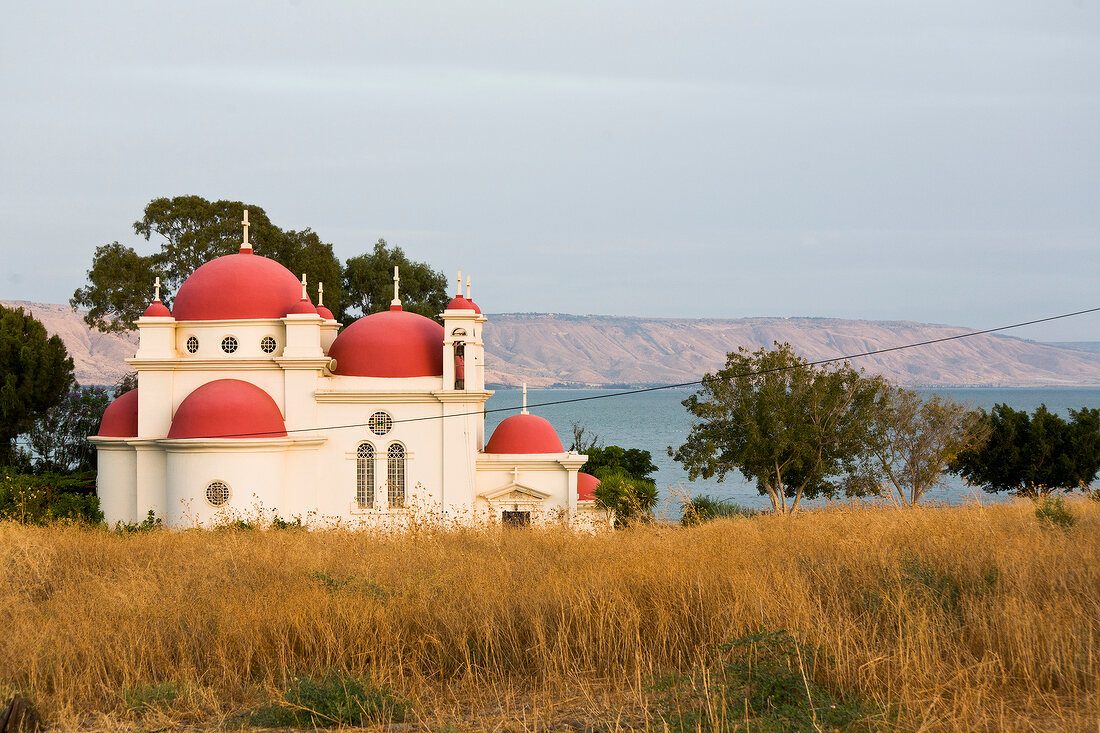 View of Church Seven Apostles with sea in background in Capernaum, Galilee, Israel