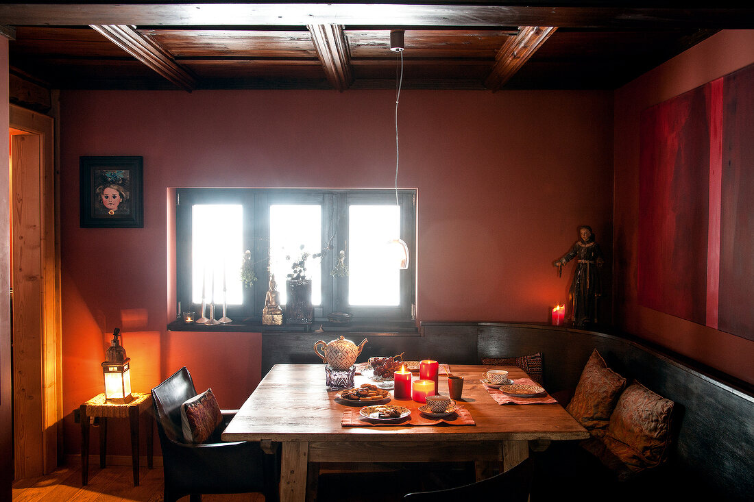 Dining area with dining table and window