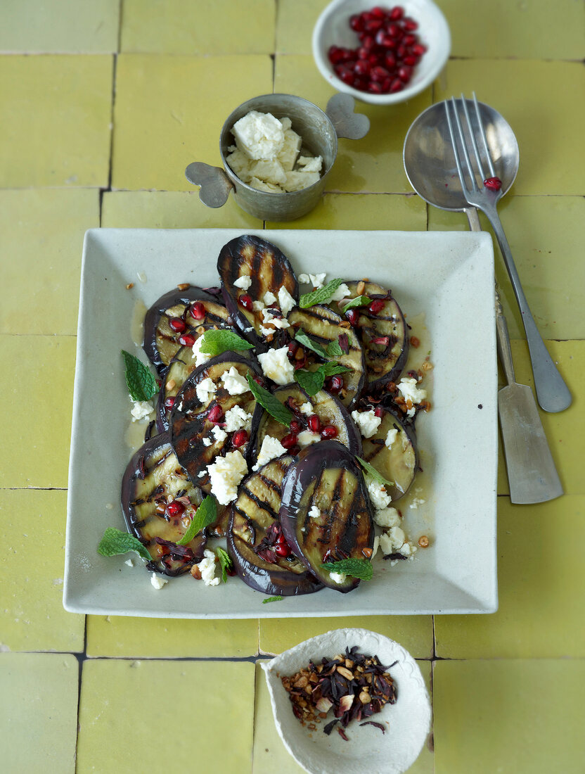 Grilled eggplant with feta cheese on plate
