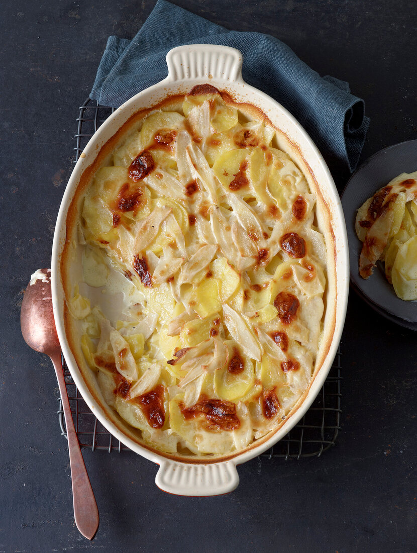 Potato gratin with salsify in serving dish