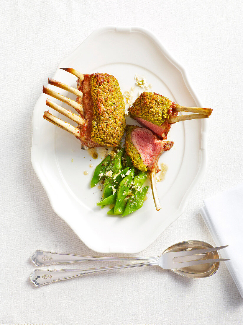 Rack of lamb with beans on plate, Bavaria, Germany