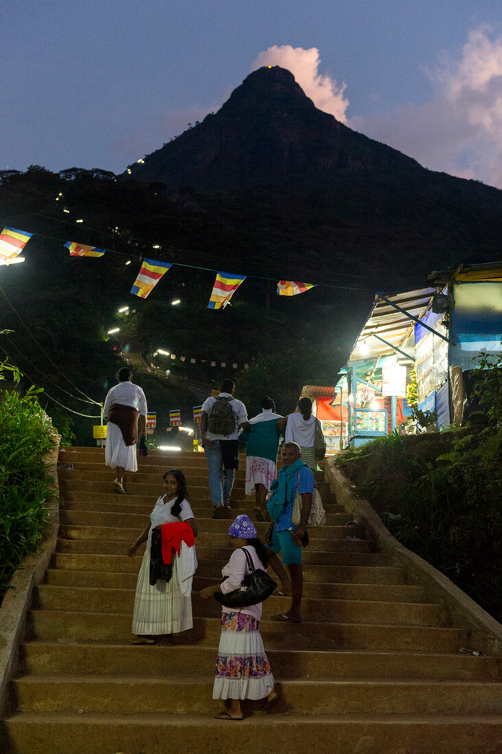 Pilgrims climbing stairs at night in Sri Pada mountain, Sri Lanka