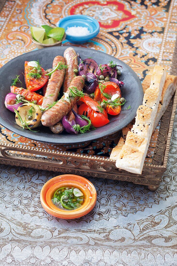 Merguez sausage with a gilled vegetable salad
